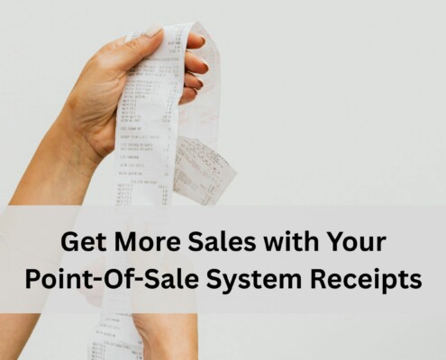 Close up of a person holding a long printed receipt with text about increasing sales using point of sale system receipts.