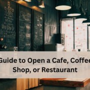 Interior of a cozy cafe with chalkboard menus and warm lighting