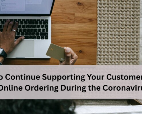 Person using a laptop while holding a credit card, representing online ordering and remote customer support during the coronavirus pandemic.