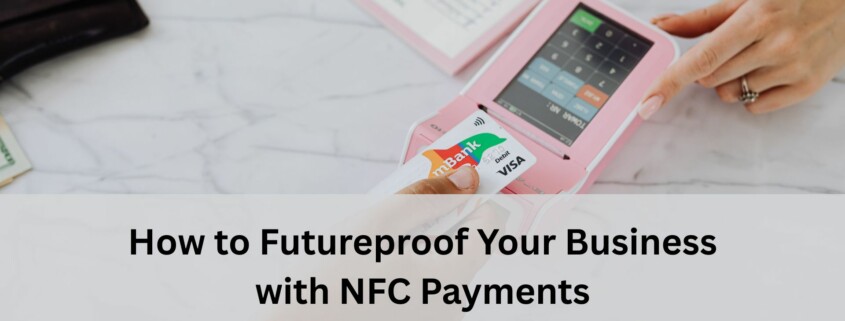 A customer taps a contactless card on a pink NFC payment terminal while another person points at the device screen