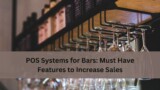 Rows of hanging wine glasses at a bar with bottles on shelves above, along with the text “POS Systems for Bars: Must Have Features to Increase Sales”