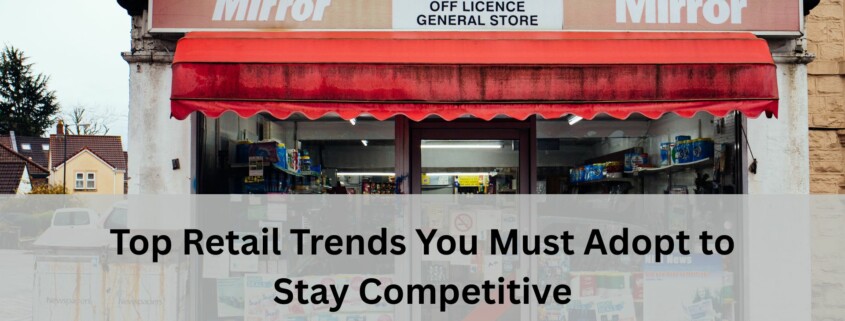 Front view of a small retail store with a red awning, newspaper signage, and various products visible through the windows