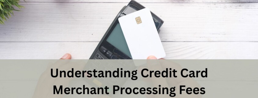 A person holds a payment terminal in one hand and taps a white credit card with the other.