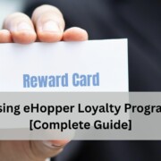 A customer in business attire holds a white reward card toward the camera