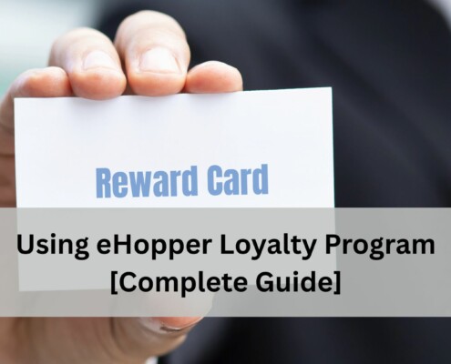 A customer in business attire holds a white reward card toward the camera