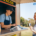 Smiling food truck employee assisting a customer with a credit card payment on a POS payment terminal