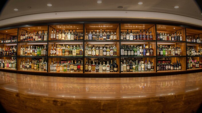 Liquor Store POS Liquor store bottles behind the counter